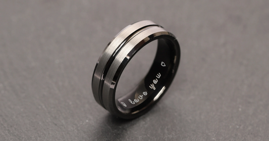 A band ring which says I love you on the inside of it