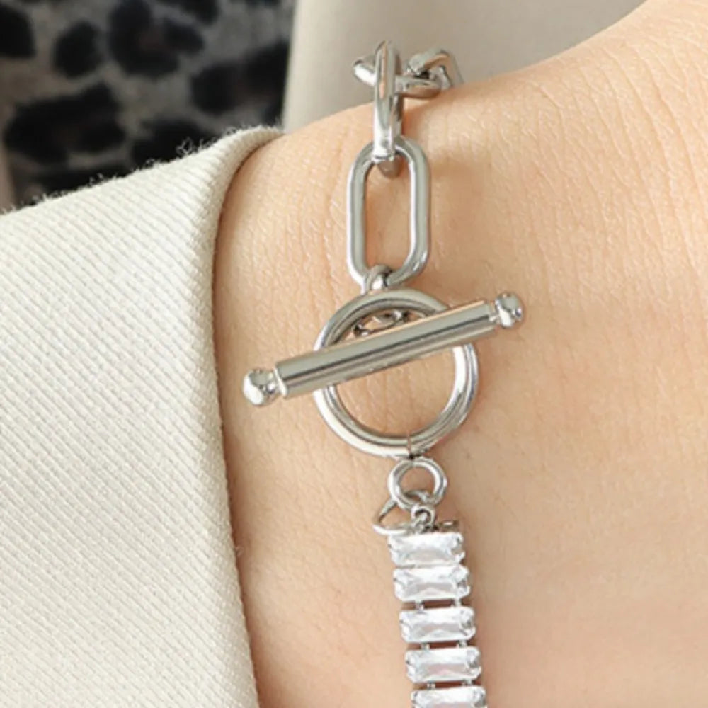 An adjustable and durable steel bracelet meant to be worn by you
