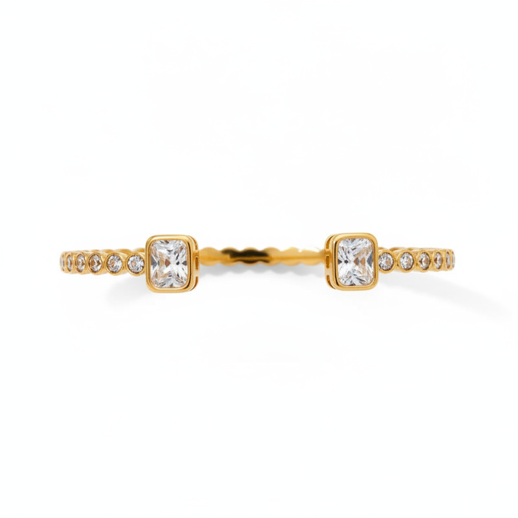 Gold bracelet with crystals on white background