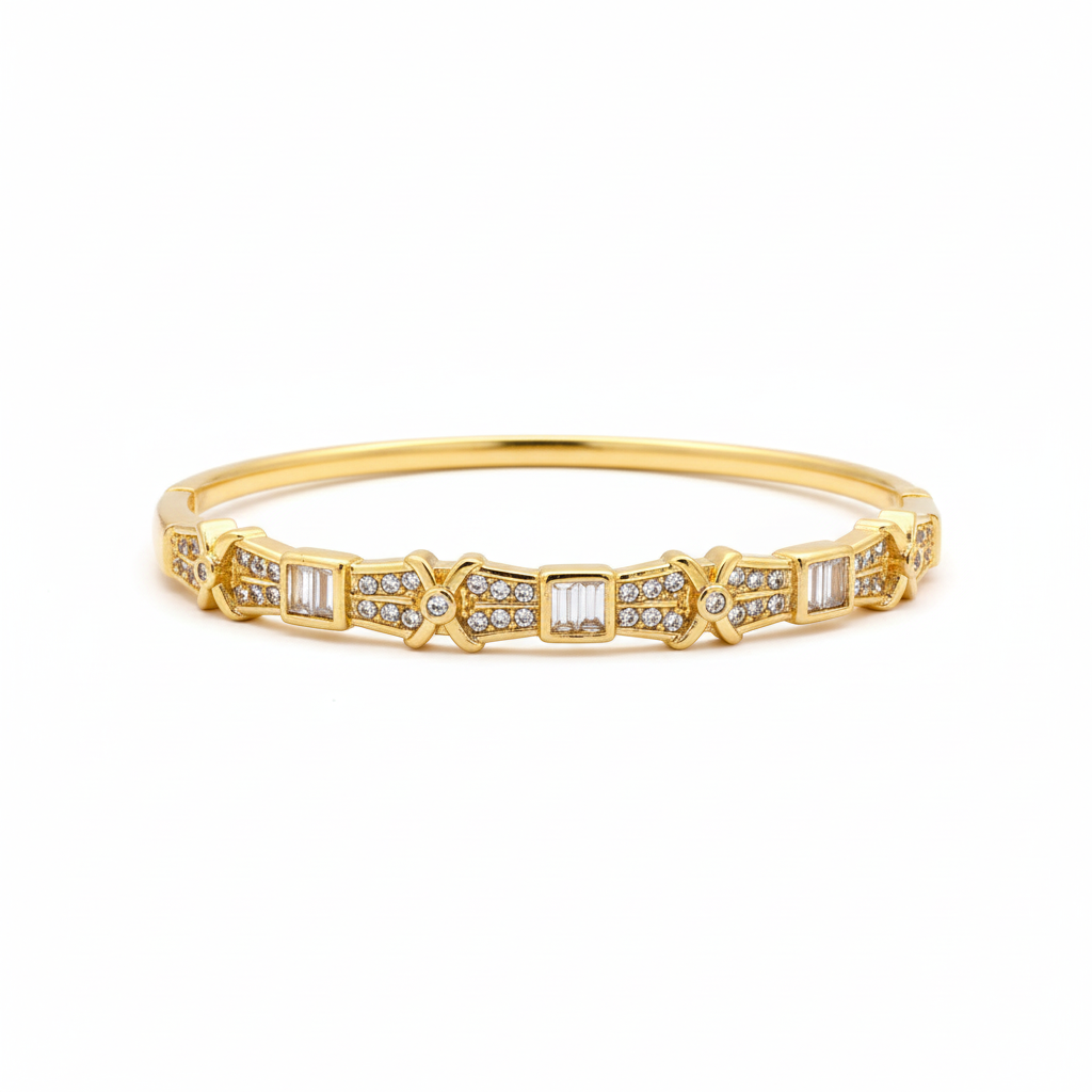 Gold crystal bangle on white background