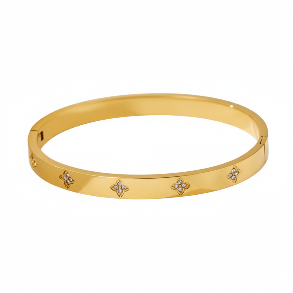 Gold flower crystal bangle horizontal on white background