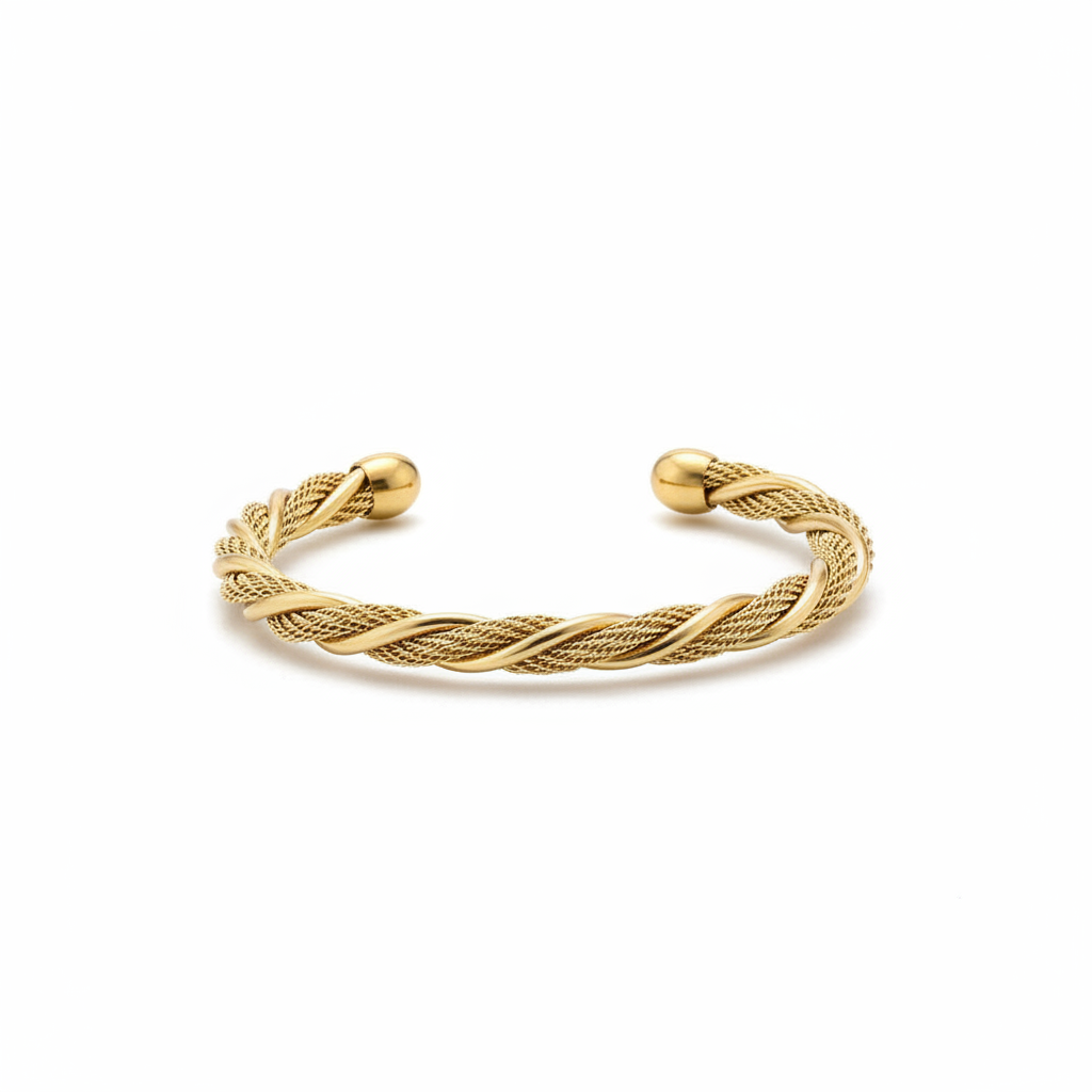 Gold spiral rope bangle on white background