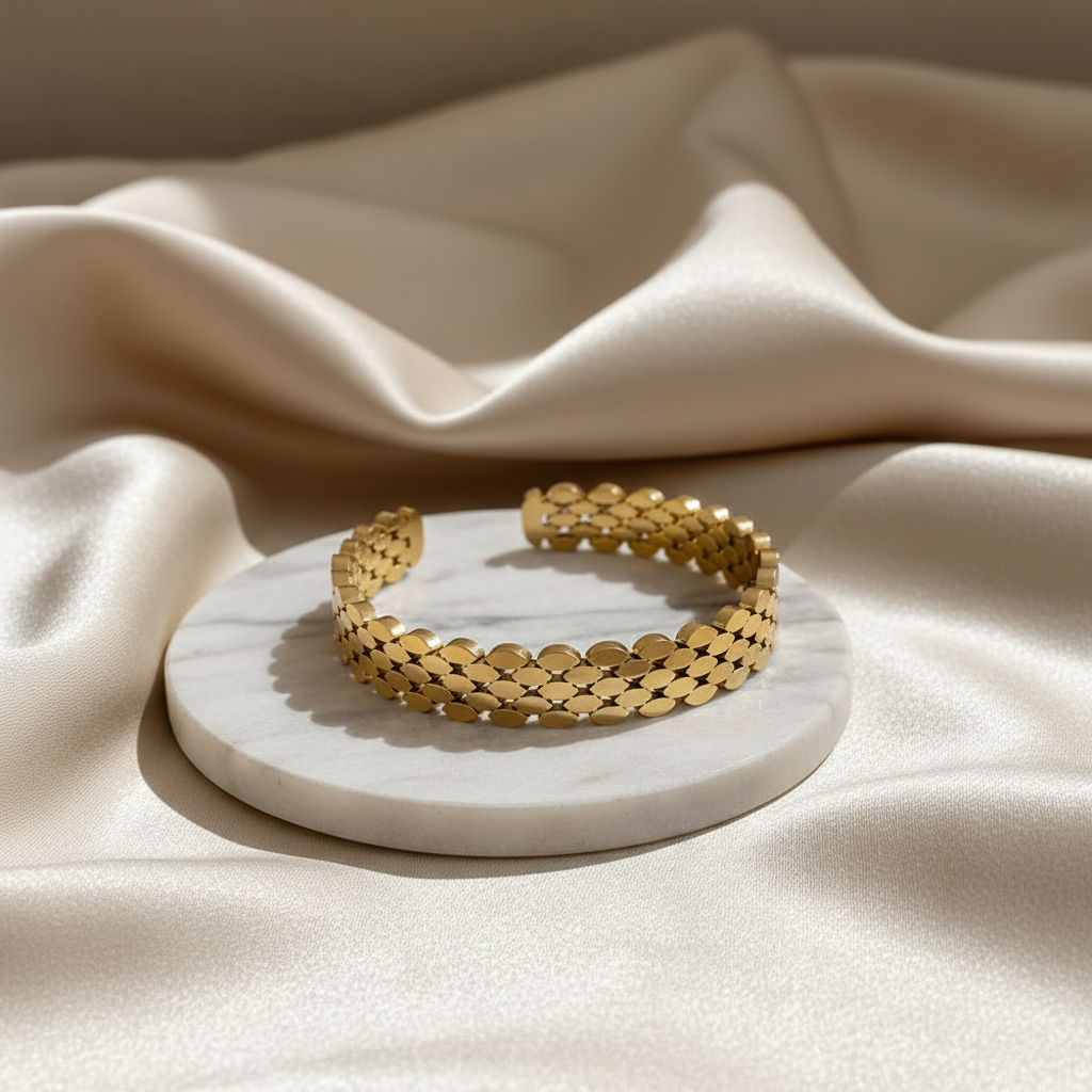 Gold textured oval bangle lifestyle shot