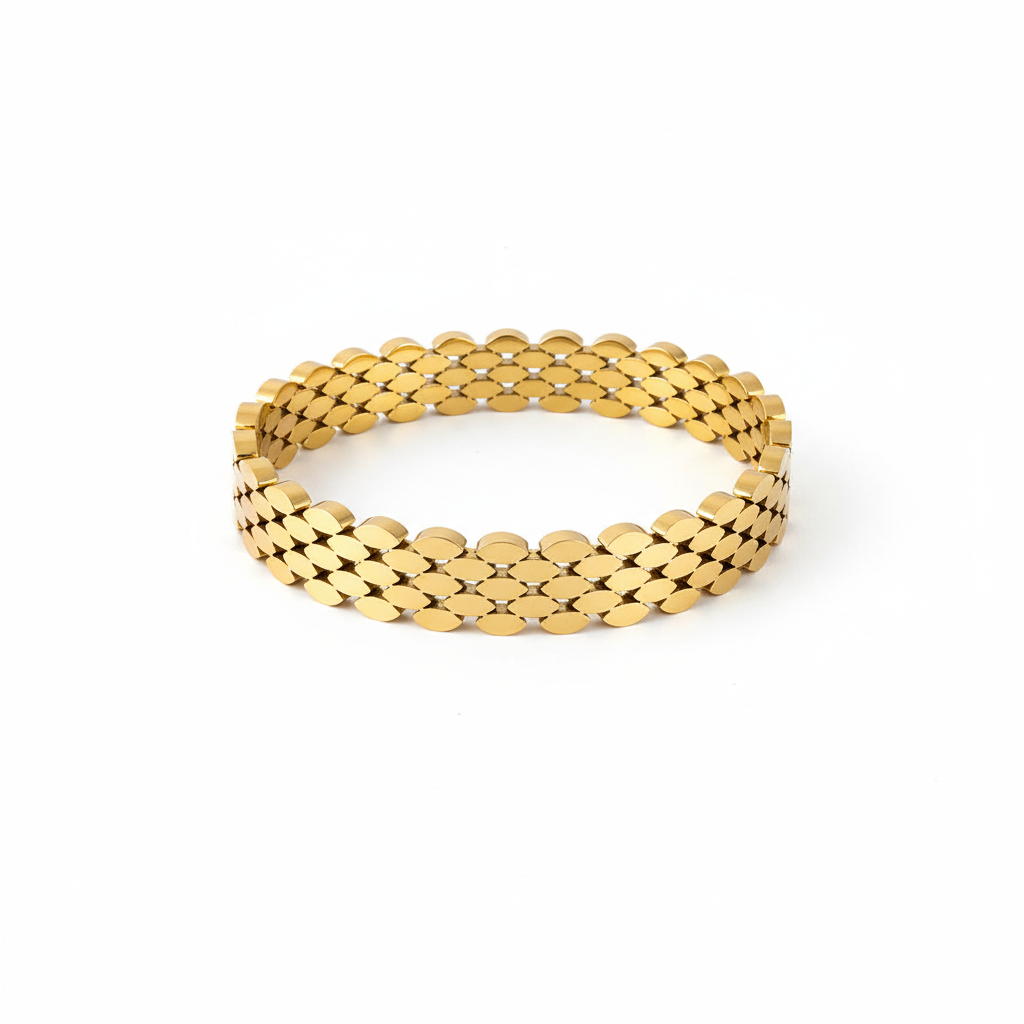 Gold textured oval bangle on white background