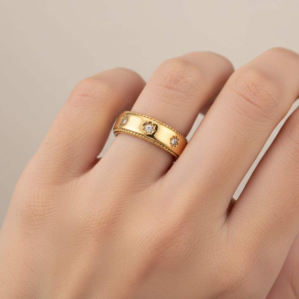 Person wearing gold star ring